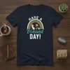 T-shirt with "HAVE A Blessed DAY!" quote, featuring a rainbow, sun, hand, and flowers design