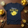 Have a SLICE Day text with stacked lemon slices graphic on a navy t-shirt