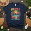 Hawaii The Aloha State t-shirt with vintage sunset, palm trees, hibiscus flowers, and ocean waves graphic