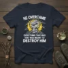 He Overcame Everything That Was Meant To Destroy Him quote on a navy t-shirt with a fist graphic