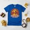 Golden Retriever wearing a "Heart of Gold Size to Match" text design on a blue t-shirt