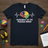 Heartbeat of the Puzzle Mind t-shirt design with a colorful puzzle piece brain and EKG line graphic