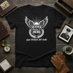 HEAVEN Needed A HERO God PICKED MY DAD text with wings and shield graphic on black t-shirt