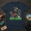 Heavy Saurus text in dripping green font with cartoon dinosaurs playing rock instruments on a navy t-shirt