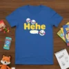 Blue t-shirt with "Hehe" text and laughing emoji graphics, representing joy and humor