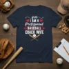 T-shirt with "Hello I AM A Professional BASEBALL COACH WIFE" text in white and red, featuring baseball graphics and hearts