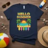 Navy t-shirt with "HELLO SUMMER" text above a beach graphic featuring palm trees, ocean waves, and colorful popsicles