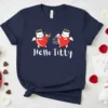 Hello Titty t-shirt design with two cute cats holding hearts, one with a bow and arrow, the other with a