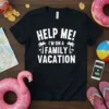 Black t-shirt with white text "HELP ME! I'M ON A FAMILY VACATION" and palm tree graphics, perfect for family trips