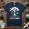 Helping Small Hands Do Big Things quote on a navy t-shirt with a tree graphic symbolizing growth and support