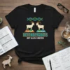 HETEROZYGOATS JUST ALLELE UNEVEN text with two goats and DNA helix graphics on a black t-shirt