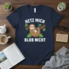 Hetz Mich Blob Nicht t-shirt design with a cute sloth holding a coffee cup while sitting on a branch. Features