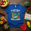Hey Don't Forget To Eat Your Fruits And Veggies t-shirt with cartoon carrot, apple, broccoli, and strawberries