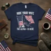 Hide Your Wife The Alpha Is Here T-Shirt with howling wolf and American flag design