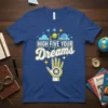 Blue t-shirt with "HIGH FIVE YOUR Dreams" text and a stylized high-five hand graphic with stars and clouds