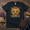 Highland Cow Scottish Heather & Honey text on a navy t-shirt with a detailed illustration of a Highland cow's face