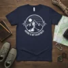 Hiking Is My Heartbeat t-shirt featuring a graphic of a hiker on a mountain peak with a heartbeat line