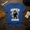 Hired Goon text and cartoon mechanic character holding a wrench on a blue t-shirt