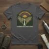 Hocking Hills State Park t-shirt design with waterfall, cliffs, trees, and rainbow graphic