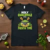 T-shirt with "HOLY GUACAMOLE IT'S FIESTA TIME" text, featuring guacamole bowl, avocados, and maracas