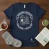 Homebody Homebody text with a charming house graphic and laurel wreath on a navy t-shirt