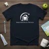 Navy blue t-shirt with white Hometown Dental Partners logo featuring a tooth inside a house with a star