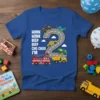 Blue t-shirt design with "Honk Honk Beep Beep Cho Choo I'm 2" text and cartoon vehicles on a road shaped