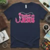 Navy blue t-shirt with "Hooked on JESUS" in pink text and a fishing hook graphic