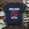 Navy t-shirt with white text "HORSE DENIER NOT REAL" and a red prohibition sign with a horse graphic inside