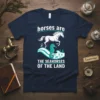 Navy t-shirt with white text "horses are THE SEAHORSES OF THE LAND" featuring a white horse jumping over a turquoise