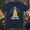 Humorous "HUMANS" t-shirt design featuring an alien abduction beam over a city skyline with two orange stars