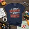 Navy t-shirt with bold orange and white text: "I AM CURRENTLY UNSUPERVISED. I KNOW, IT FREAKS ME OUT TOO. BUT