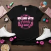 Black t-shirt with pink text "I AM ROLLING WITH friends GIRLS NIGHT OUT" design for roller skating girls night out