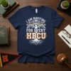 I AM ROOTING FOR EVERY HBCU text design with a tree graphic and Pan-African flag colors on a navy t-shirt