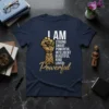 I AM STRONG SMART POWERFUL INTELLIGENT BEAUTIFUL KIND LOVED Powerful text with golden fist graphic on navy t-shirt