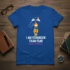 Blue t-shirt with white text "I AM STRONGER THAN FEAR" and purple text "MALALA YOUSAFZAI", featuring a graphic of a