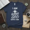 I Am Who God Says I Am Christian T-Shirt featuring white text and a cross graphic on a navy blue
