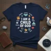 Navy t-shirt with "I Am A Child of God" central text surrounded by circular affirmations like Treasured, Accepted, and Loved