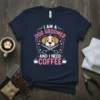 I Am A Dog Groomer And I Need Coffee T-Shirt featuring a cute dog face, scissors, and coffee cups