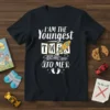 Youngest twin shirt with text "I Am The Youngest Twin Rules Don't Apply To Mes" and a rocket graphic