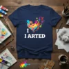 Navy blue t-shirt with "I ARTED" text and a colorful heart-shaped paint palette graphic