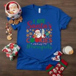 Christmas t-shirt with "I Ate Santa's Cookies #noregrets" text, featuring Santa Claus holding cookies and surrounded by festive holiday graphics