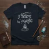 I Believe in Magic quote t-shirt with a castle graphic and stars, featuring whimsical typography