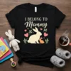 Black t-shirt with "I Belong To Mommy" text and cute bunny graphics, perfect for Easter and moms