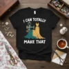 Black t-shirt with white text 'I Can Totally Make That' and a graphic of a cat sewing a dress
