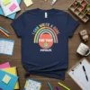 Navy blue t-shirt with colorful rainbow graphic and text "I CAN WRITE A GOAL FOR THAT #SPEDLIFE" for sped teachers