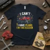 T-shirt with the text "I Can't I Have Plans In The Garage" and a graphic of a red car on