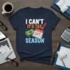 I Can't It's Tax Season T-Shirt with money and calendar graphic, navy blue tee, humorous tax design
