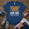 Navy blue t-shirt with orange text "I CHEER FOR THE THE AWESOME PUNTER" and a graphic of a football punter