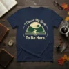 I Closed My Book To Be Here quote t-shirt design with an open book and mountain landscape graphic